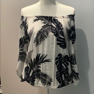 Old Navy white with tropical black leaves.